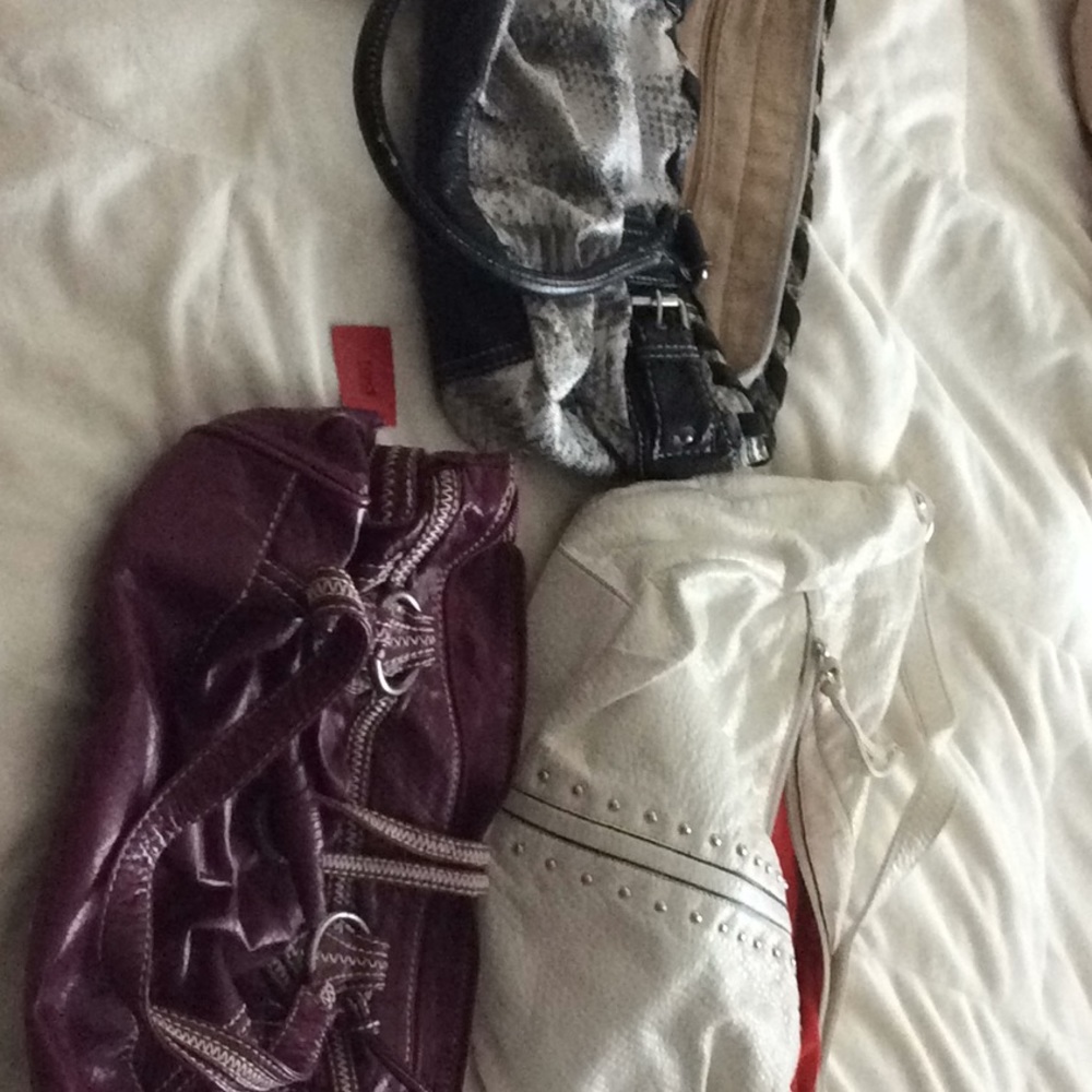 Three Marc Ecko purses